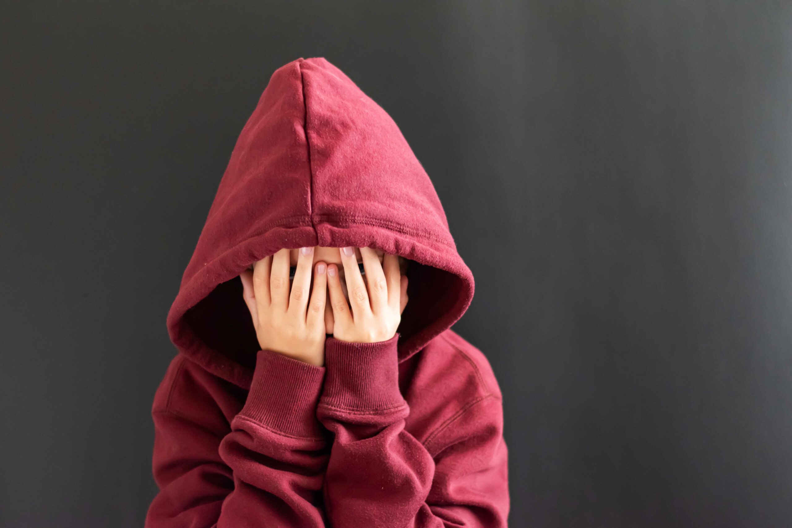 Teenage Child Cries With His Hands Covered Sadness Problems resized